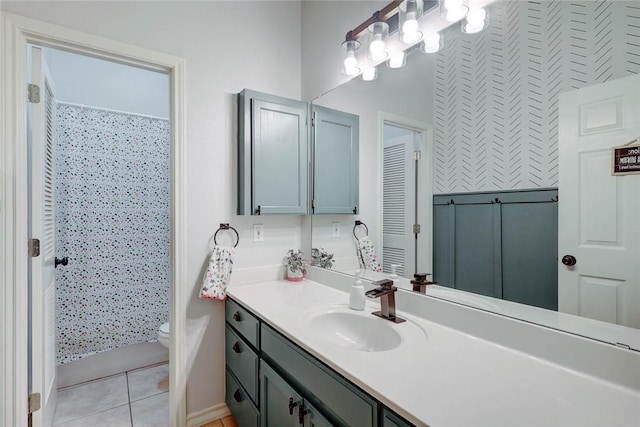 4409 Sue Cir, Corpus Christi, TX 78410 - full bathroom featuring tile patterned flooring, toilet, vanity, and a shower with curtain