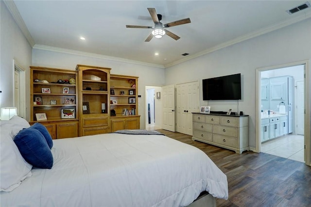 4409 Sue Cir, Corpus Christi, TX 78410 - bedroom with visible vents, ornamental molding, ceiling fan, connected bathroom, and wood finished floors