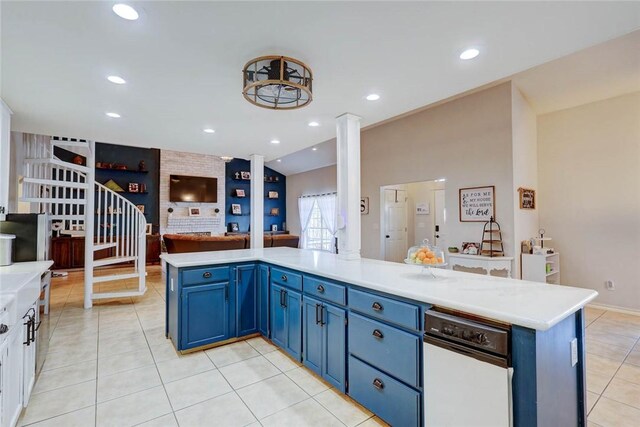 4409 Sue Cir, Corpus Christi, TX 78410 - kitchen with recessed lighting, open floor plan, light countertops, light tile patterned flooring, and blue cabinets
