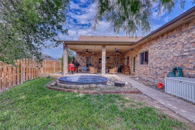 4409 Sue Cir, Corpus Christi, TX 78410 - view of yard featuring a ceiling fan, a patio, and fence