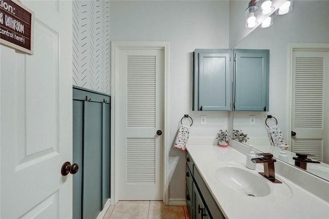 4409 Sue Cir, Corpus Christi, TX 78410 - bathroom featuring a closet, tile patterned floors, and vanity