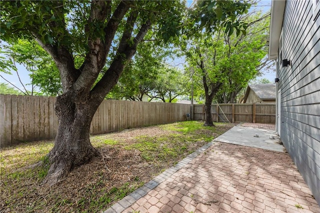 4925 Valley Stream Dr, Corpus Christi, TX 78413 - fenced backyard with a patio area