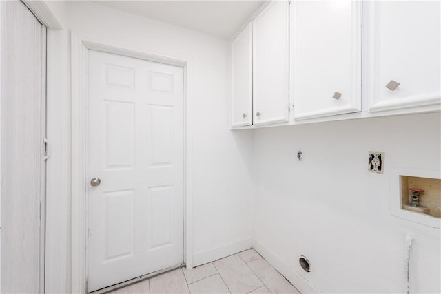 4925 Valley Stream Dr, Corpus Christi, TX 78413 - laundry area featuring electric dryer hookup, cabinet space, washer hookup, and baseboards
