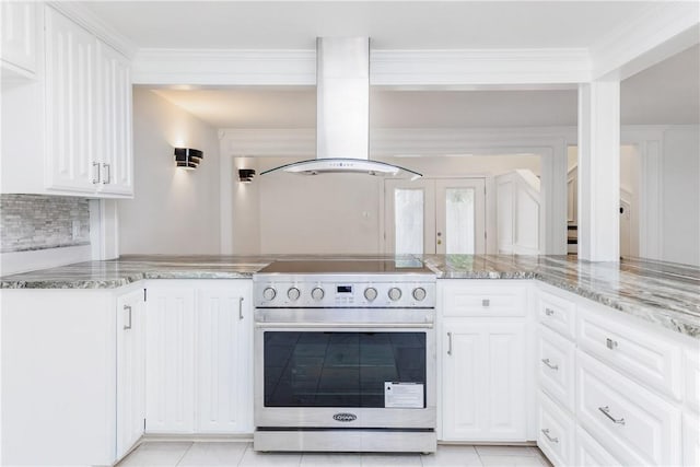 4925 Valley Stream Dr, Corpus Christi, TX 78413 - kitchen featuring stainless steel stove, island range hood, light stone countertops, and tasteful backsplash
