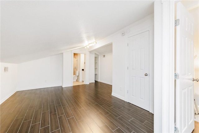 4925 Valley Stream Dr, Corpus Christi, TX 78413 - bonus room with dark wood-type flooring and baseboards