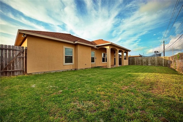 3813 Elvis Dr, Corpus Christi, TX 78414 - rear view of property featuring stucco siding