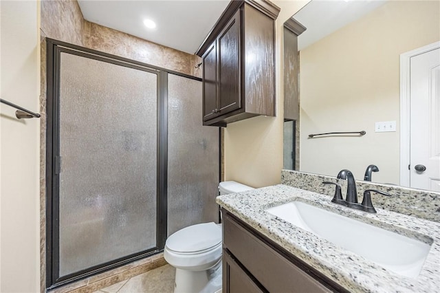 3813 Elvis Dr, Corpus Christi, TX 78414 - bathroom featuring vanity, a stall shower, toilet, and tile patterned flooring
