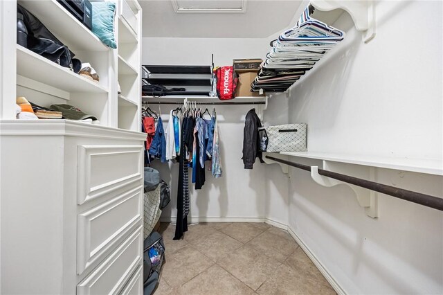 3813 Elvis Dr, Corpus Christi, TX 78414 - spacious closet with light tile patterned flooring