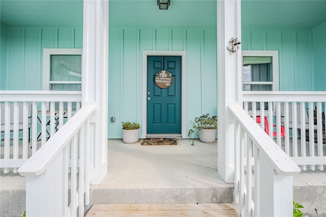 property entrance featuring covered porch