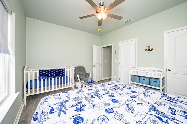 bedroom featuring wood-type flooring and ceiling fan