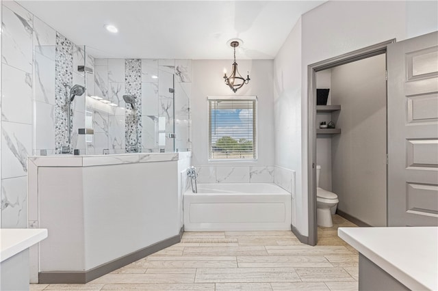 full bathroom featuring vanity, independent shower and bath, toilet, and a notable chandelier