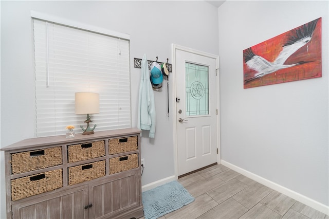 doorway with light hardwood / wood-style flooring