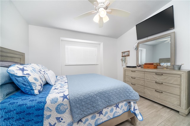 bedroom featuring light wood-type flooring and ceiling fan