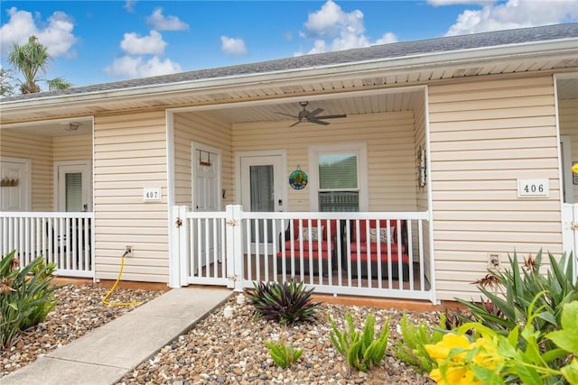 property entrance with ceiling fan and covered porch