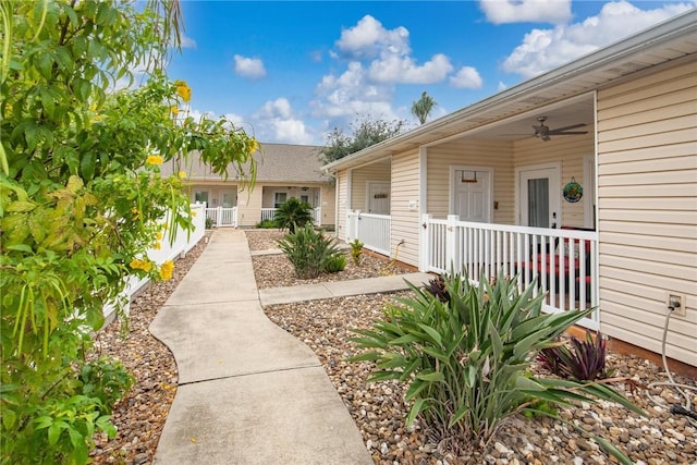 view of front of home with covered porch and ceiling fan