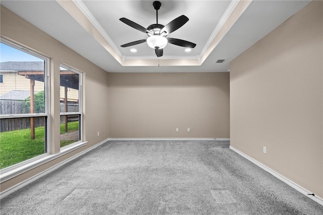 7406 Brush Creek Dr, Corpus Christi, TX 78414 - carpeted spare room featuring a tray ceiling, ornamental molding, ceiling fan, baseboards, and recessed lighting