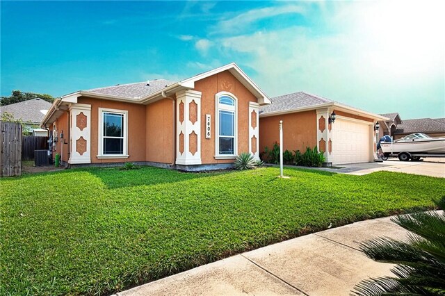 7406 Brush Creek Dr, Corpus Christi, TX 78414 - ranch-style home featuring an attached garage, concrete driveway, stucco siding, and central air condition unit