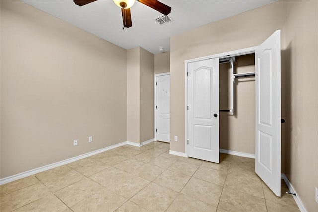 7406 Brush Creek Dr, Corpus Christi, TX 78414 - unfurnished bedroom featuring light tile patterned floors, baseboards, a closet, and a ceiling fan