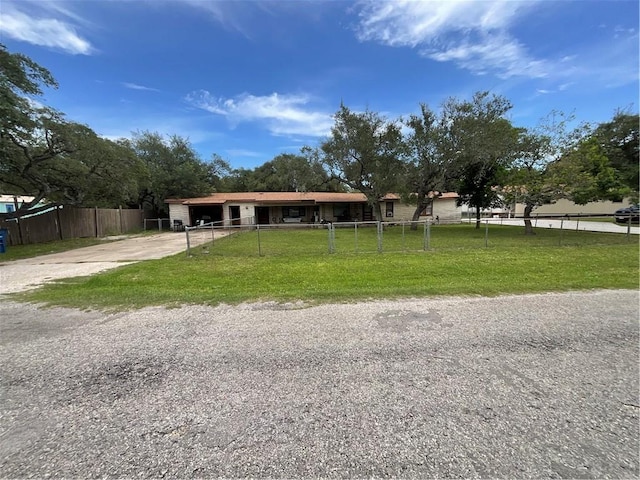 3128 Hackberry Ave, Ingleside, TX 78362 - ranch-style home with concrete driveway and an attached garage