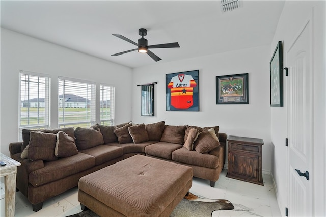 living room featuring ceiling fan