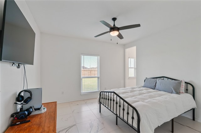 bedroom featuring ceiling fan