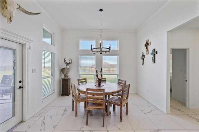 dining space featuring a chandelier and crown molding