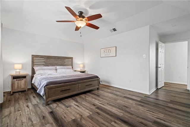 bedroom with dark wood-type flooring, visible vents, ceiling fan, and baseboards