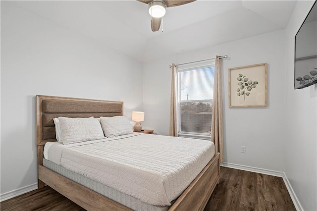 bedroom featuring dark wood-style floors, baseboards, and a ceiling fan