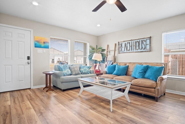906 S Young St, Rockport, TX 78382 - living room with light wood-style floors, ceiling fan, baseboards, and recessed lighting