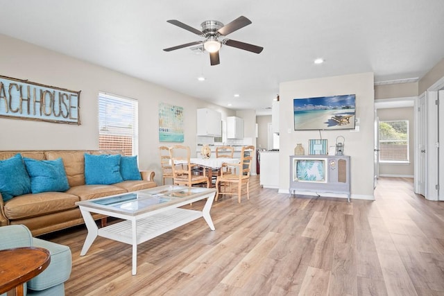 906 S Young St, Rockport, TX 78382 - living area featuring recessed lighting, ceiling fan, light wood finished floors, and baseboards
