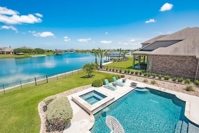 5716 S Oso Pkwy, Corpus Christi, TX 78414 - view of swimming pool featuring a patio area, a water view, and a pool with connected hot tub