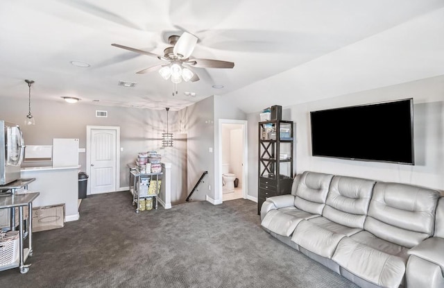 5716 S Oso Pkwy, Corpus Christi, TX 78414 - living room featuring dark carpet, a ceiling fan, baseboards, and lofted ceiling
