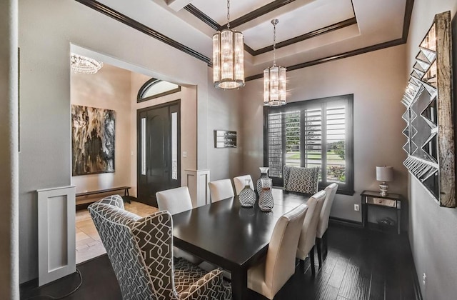 5716 S Oso Pkwy, Corpus Christi, TX 78414 - dining area featuring crown molding, a chandelier, baseboards, and dark wood-type flooring