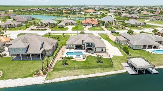 5716 S Oso Pkwy, Corpus Christi, TX 78414 - aerial perspective of suburban area featuring a pool area and a nearby body of water