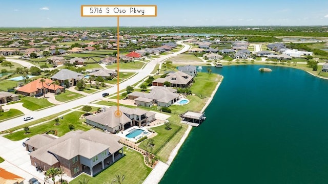5716 S Oso Pkwy, Corpus Christi, TX 78414 - aerial overview of property's location featuring a large body of water and nearby suburban area