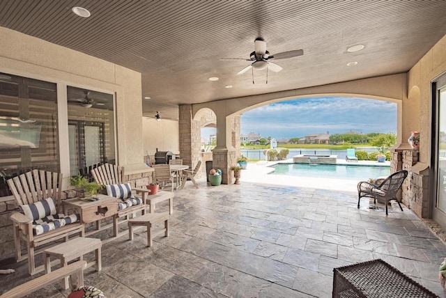 5716 S Oso Pkwy, Corpus Christi, TX 78414 - view of patio with a ceiling fan and a pool with connected hot tub