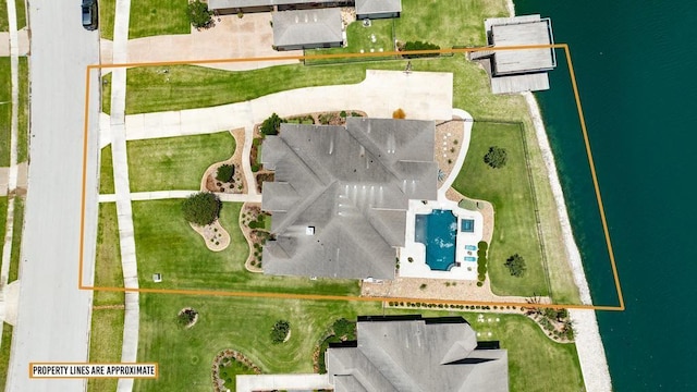5716 S Oso Pkwy, Corpus Christi, TX 78414 - drone / aerial view of a pool area and a nearby body of water