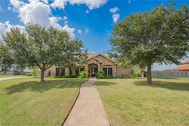 view of front of home with a front yard