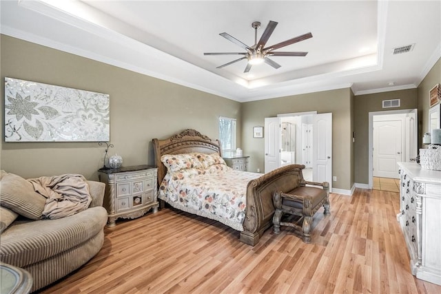 5309 Fox Glove, Corpus Christi, TX 78413 - bedroom with a tray ceiling, light wood-type flooring, baseboards, crown molding, and a ceiling fan