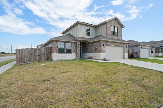 view of front of house with a garage and a front lawn