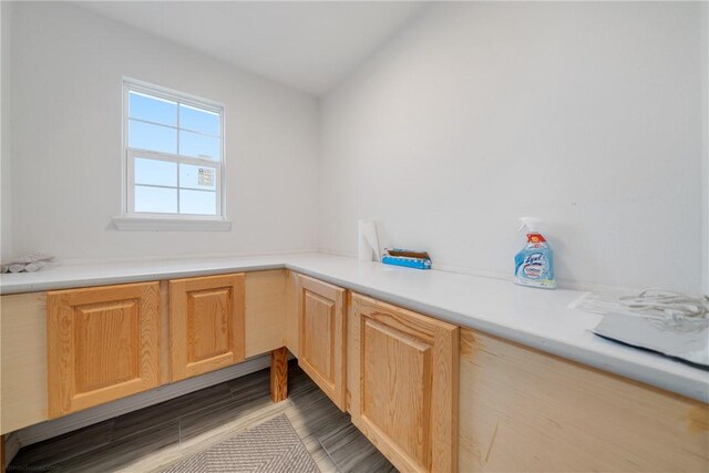 washroom with hardwood / wood-style floors