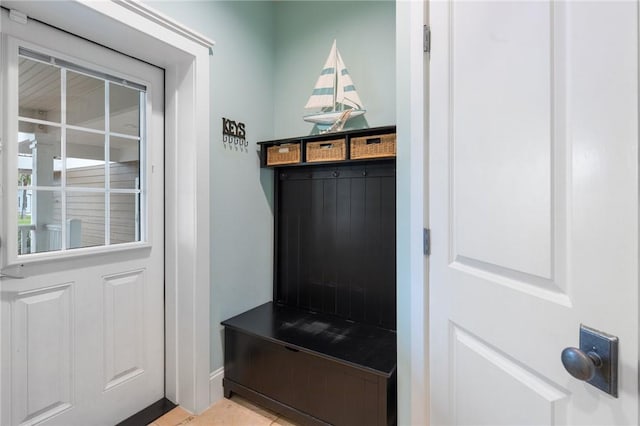 mudroom with light tile patterned floors