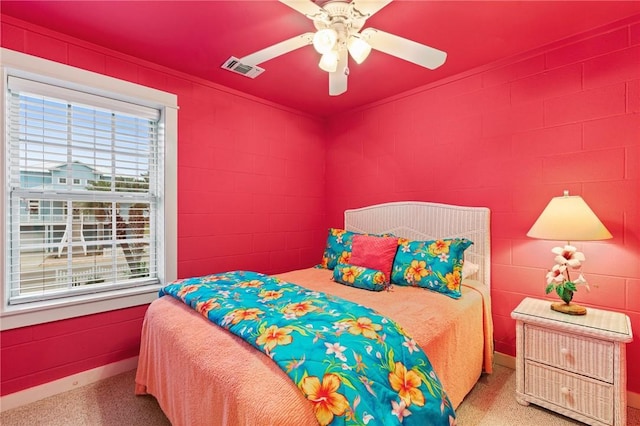 bedroom with ceiling fan and carpet floors