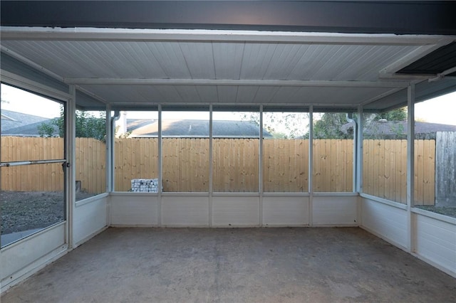 unfurnished sunroom featuring a healthy amount of sunlight