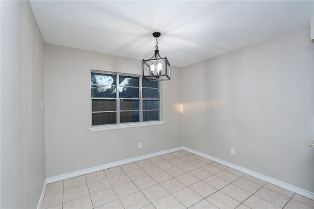 unfurnished dining area featuring light tile patterned floors and a chandelier