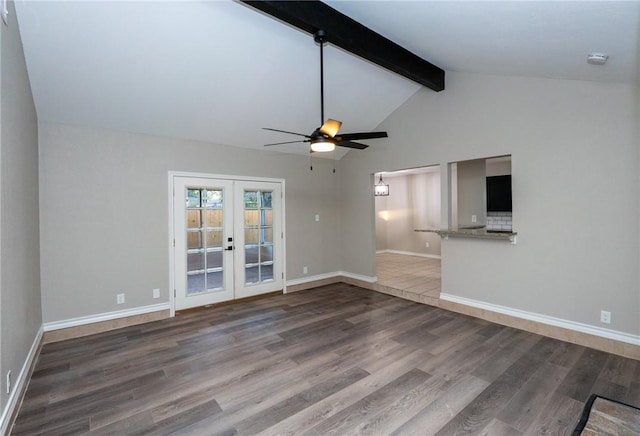 unfurnished living room featuring french doors, vaulted ceiling with beams, ceiling fan, and wood-type flooring