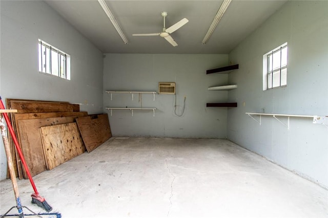 7322 Milky Way Dr, Corpus Christi, TX 78412 - garage featuring a wall mounted air conditioner and ceiling fan
