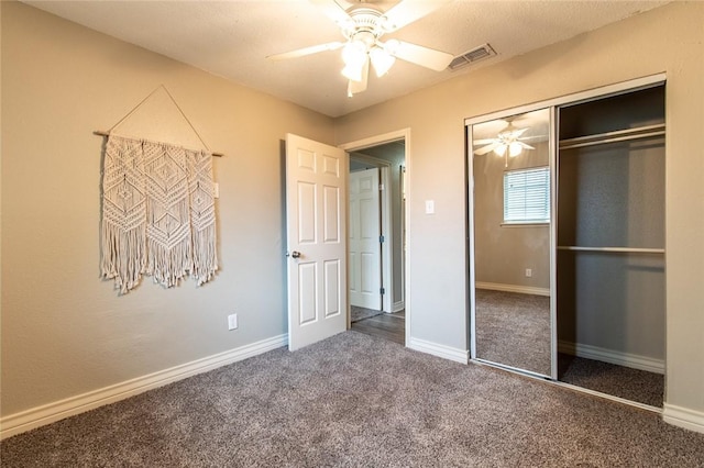 7322 Milky Way Dr, Corpus Christi, TX 78412 - unfurnished bedroom with carpet, a closet, and ceiling fan