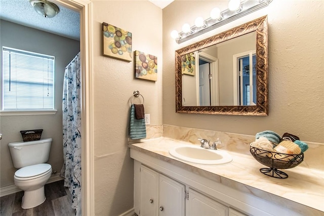 7322 Milky Way Dr, Corpus Christi, TX 78412 - bathroom with vanity, wood finished floors, and curtained shower