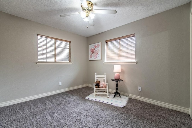 7322 Milky Way Dr, Corpus Christi, TX 78412 - living area featuring plenty of natural light, carpet floors, ceiling fan, and a textured ceiling